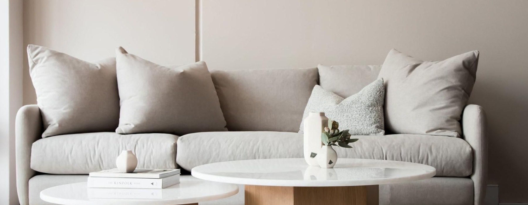 a white couch with a coffee table